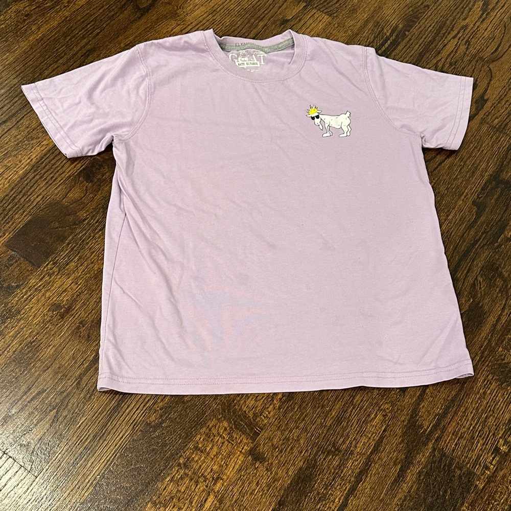 GOAT USA lavender T-Shirt with white GOAT on front